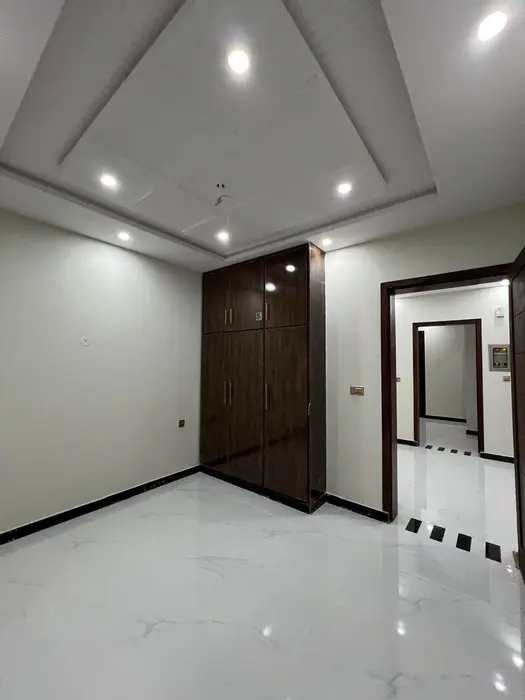 10 Marla Brand New House for Sale in Tariq Garden Lahore .