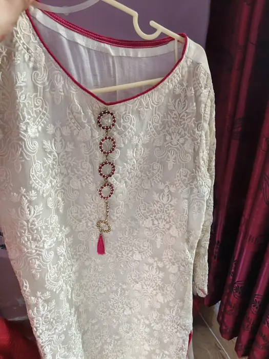 It's pure organza fully embroidery shirt