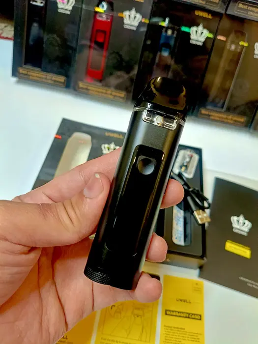 Uwell Caliburn Crown D MOD heavy with display screen device.